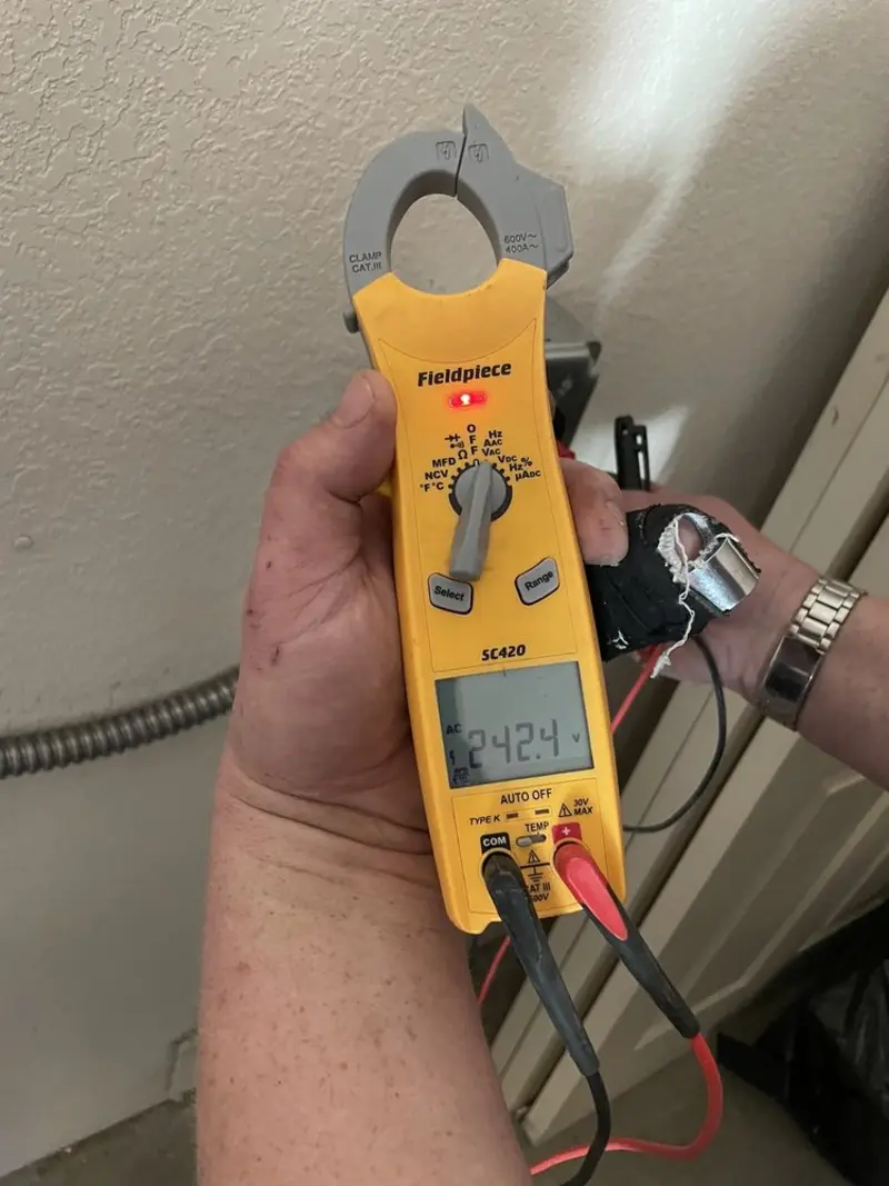 Voltage testing with clamp meter during Aluminum Wiring Replacement in Dardanelle